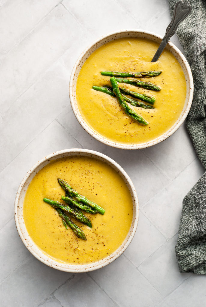 asparagus soup in two bowls