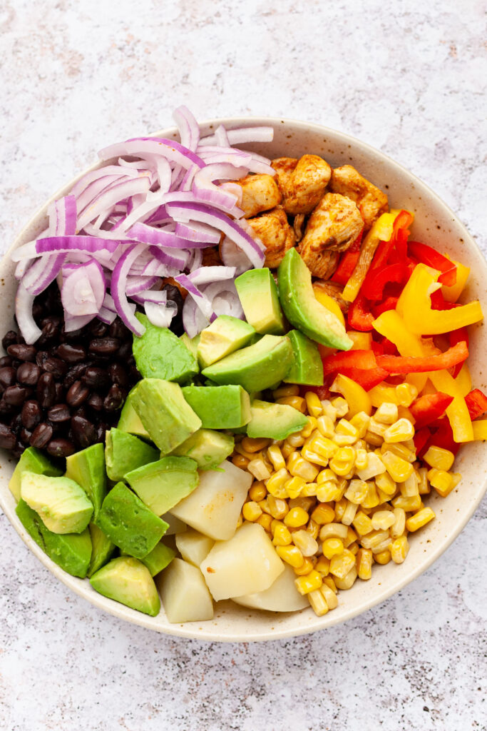 Mexican chicken salad in a round dish without dressing.