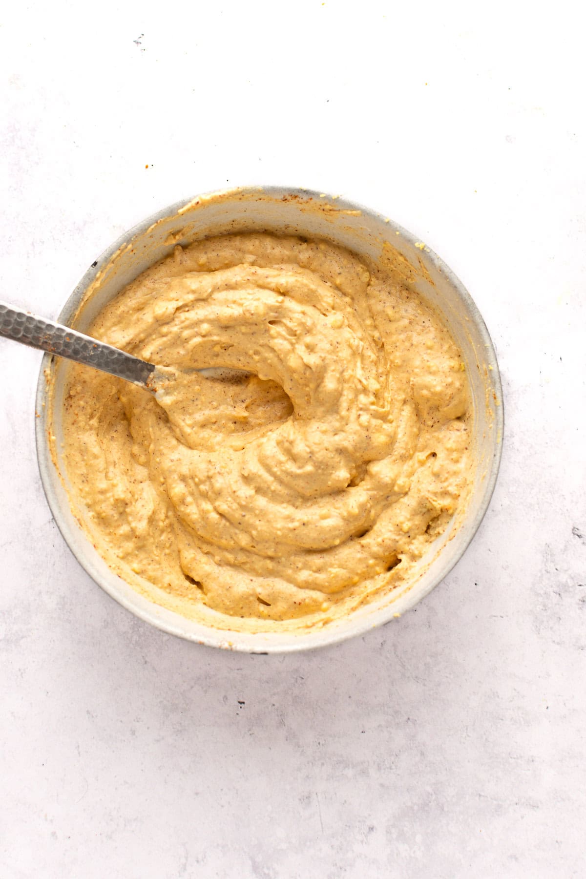A bowl with filling for Mexican deviled eggs.