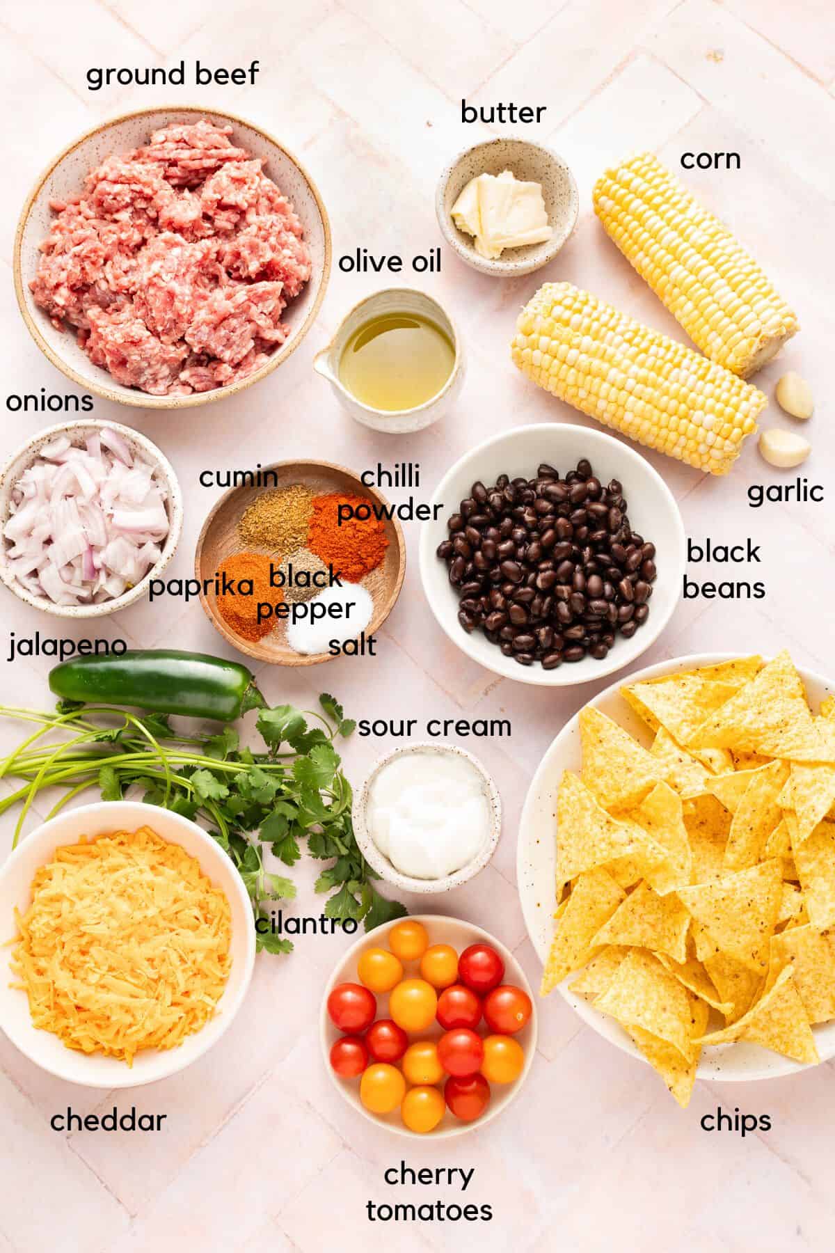 Labelled ingredients for sheet pan beef nachos.