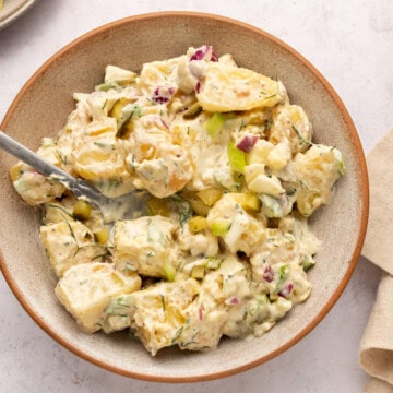 Dill pickle potato salad in a bowl.